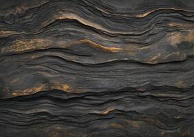 Black and Gold Swirling Wood Texture with Rich Natural Patterns photo