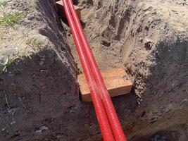 Insulating plumbing pipes with thermal foam wrap 3 photo