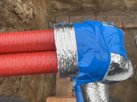 Insulating plumbing pipes with thermal foam wrap 6 photo