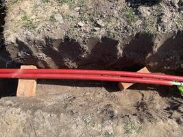 Insulating plumbing pipes with thermal foam wrap 4 photo