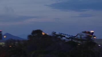 BARCELONA, SPAIN JANUARY 7, 2025. Passenger airplane gaining altitude, soaring skyward after departing airport runway during early morning light, climbing above clouds with powerful ascent video