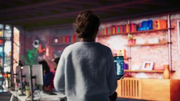 Customer service agents using AI technology to track customer shipping parcels. Call center office workers using artificial intelligence software to track package deliveries video