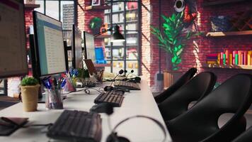 Customer support office with PC devices used to assist customers with technical issues and diagnosing problems. Call center workplace with computer used to do complaint resolution video
