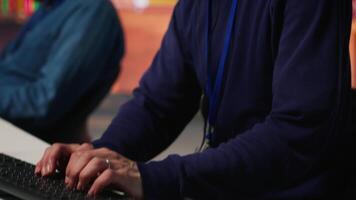 IT tech support employee assisting clients needing help, providing accurate information. Call center senior agent helping customers regain access to accounts, fixing technical issues, camera A video
