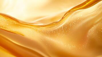 Golden silk fabric with sparkling texture and soft waves photo
