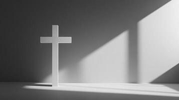 White cross in sunlit minimalist space with geometric shadows photo