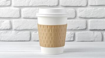 Disposable coffee cup with holder against white brick wall background photo