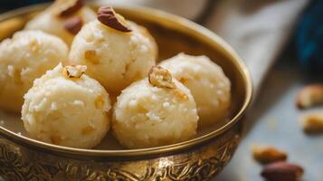 Traditional kerala sweet ladoo close-up with almond garnish for celebration themes.Vishu day photo