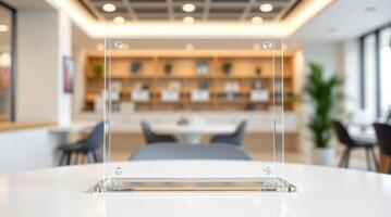 A clear acrylic display on a table in a restaurant photo