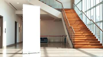 A white roll up banner in a lobby photo