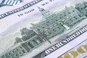 The banknote of one hundred US dollars the reverse side closeup photo