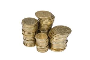 Stacks of copper Ukrainian coins on white background photo