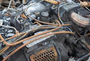 Fragment of a rusty diesel engine photo