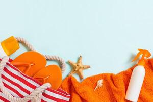Summer bag background copy space. Flat lay photo on color table, travel concept. Free space , mock-up