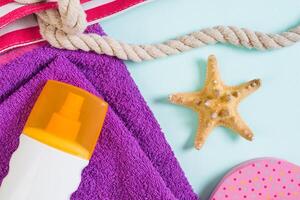 Summer bag background copy space. Flat lay photo on color table, travel concept. Free space for text,