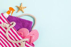 Summer bag background with copy space.Flat lay photo on color table, travel concept. Free space for text, mock-up