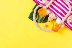 Summer bag background with copy space. Flat lay photo on color table, travel concept. Free space for text,up
