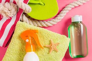 Summer bag background with copy space. Flat lay photo on color table, travel concept. Free space for text, up