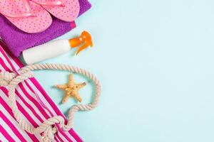 Summer bag background with copy space. Flat lay photo color table,travel concept. Free space for text