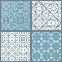 Set of four vintage symmetric seamless patterns vector