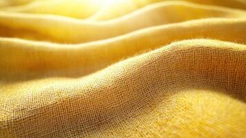 Golden fabric texture, sunlight, soft waves, background blur, textile design photo