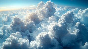 A summer afternoon with a beautiful bouquet of white fluffy clouds drifting across a bright clear sky photo