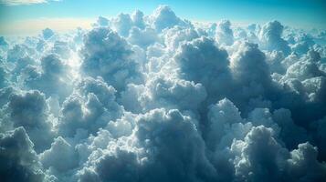 White fluffy soft clouds clustered in the sky on a summer afternoon photo