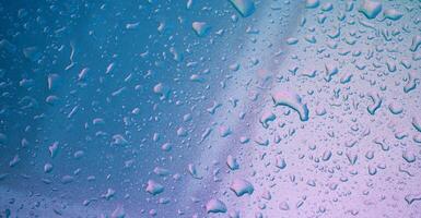 abstract pearl background with texture of rain drops on metal surface close-up photo