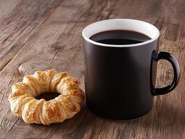 coffee cup with flaky pastry on rustic table creates cozy atmosphere photo