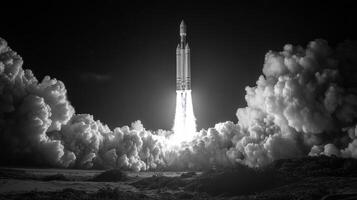 A massive rocket lifts off from its launchpad, illuminating the night sky with a brilliant burst of fire and smoke as it embarks on a significant space mission to deliver its payload into orbit. photo