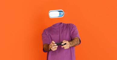 A user stands isolated against an orange background, actively participating in virtual reality with a modern headset. The individual holds a controller, fully immersed in the experience. photo