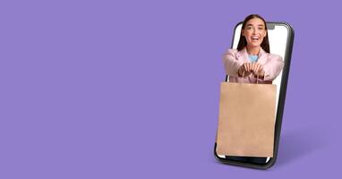 A person is happily making a purchase with a smartphone, holding a shopping bag as if coming from an online store. The vibrant background adds energy to the shopping experience. photo