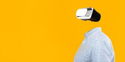 A user interacts with a virtual reality headset, fully engaged in a tech experience. The absence of a head adds a surreal feel against a vibrant yellow background, showcasing modern gadgetry. photo