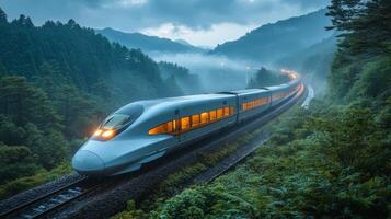A sleek high speed train travels along a winding railway in a lush, mountainous landscape during twilight, highlighting advancements in logistics and infrastructure. photo
