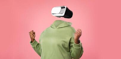 A person is immersed in a virtual reality experience using modern goggles. photo