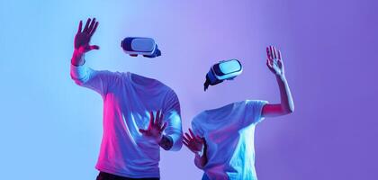Two users engage with virtual reality gadgets, wearing headsets and using their hands to interact with a digital environment. They stand against a vibrant background, fully immersed. photo