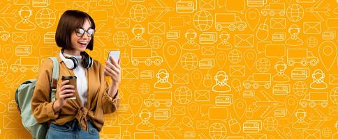 A young customer with glasses enjoys her coffee while using a smartphone to browse an online shopping application. The bright background features icons related to delivery and commerce. photo