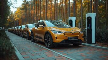 Rows of electric vehicles are parked at a charging station nestled among trees, showcasing advancements in transportation and infrastructure for renewable energy usage. photo