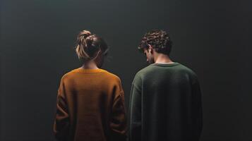 This Two people stand back to back, embodying tension and disagreement while seeking understanding. photo