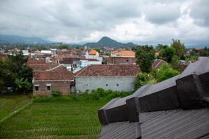 A view of a city from a roof photo