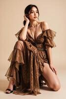 Oversized batik design with soft tulle elements modeled in studio photo