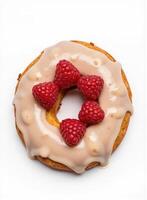 A donut with raspberries on top enjoyment photo