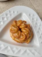 A donut on a plate photo