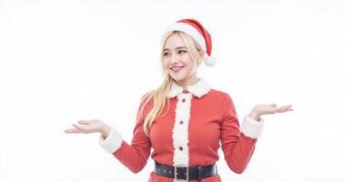 A woman in a santa claus outfit is holding something photo