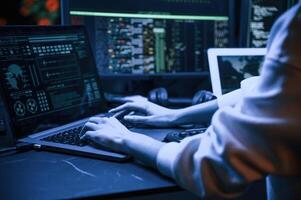 Close up view of female hacker hands, typing on keyboard photo