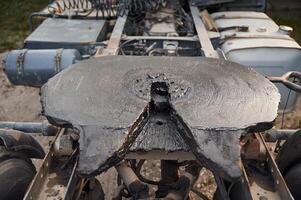 Close up view of truck part where trailer is meant to connect photo