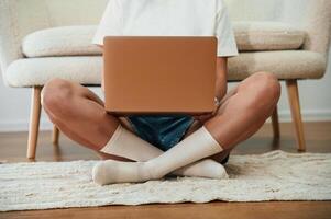 Close ,up view of woman that is using laptop photo