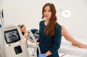 Modern ,device.. Getting photo ,rejuvenation procedure at cosmetology clinic. Women in beauty salon