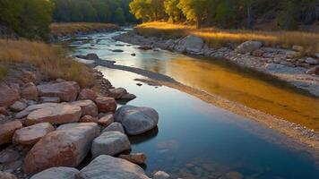 Serene river scene with smooth stones and lush greenery under soft sunlight. photo