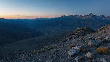 Majestic Mountains Valley View From Rocky Peak at Dusk photo